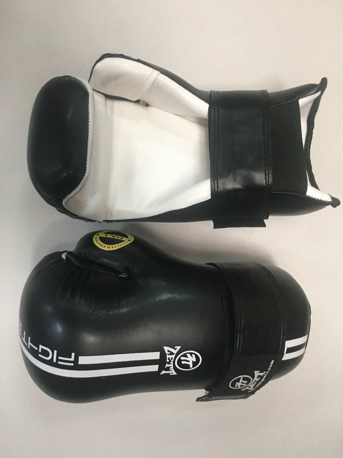 Zett ISKA sparring gloves in green, side view