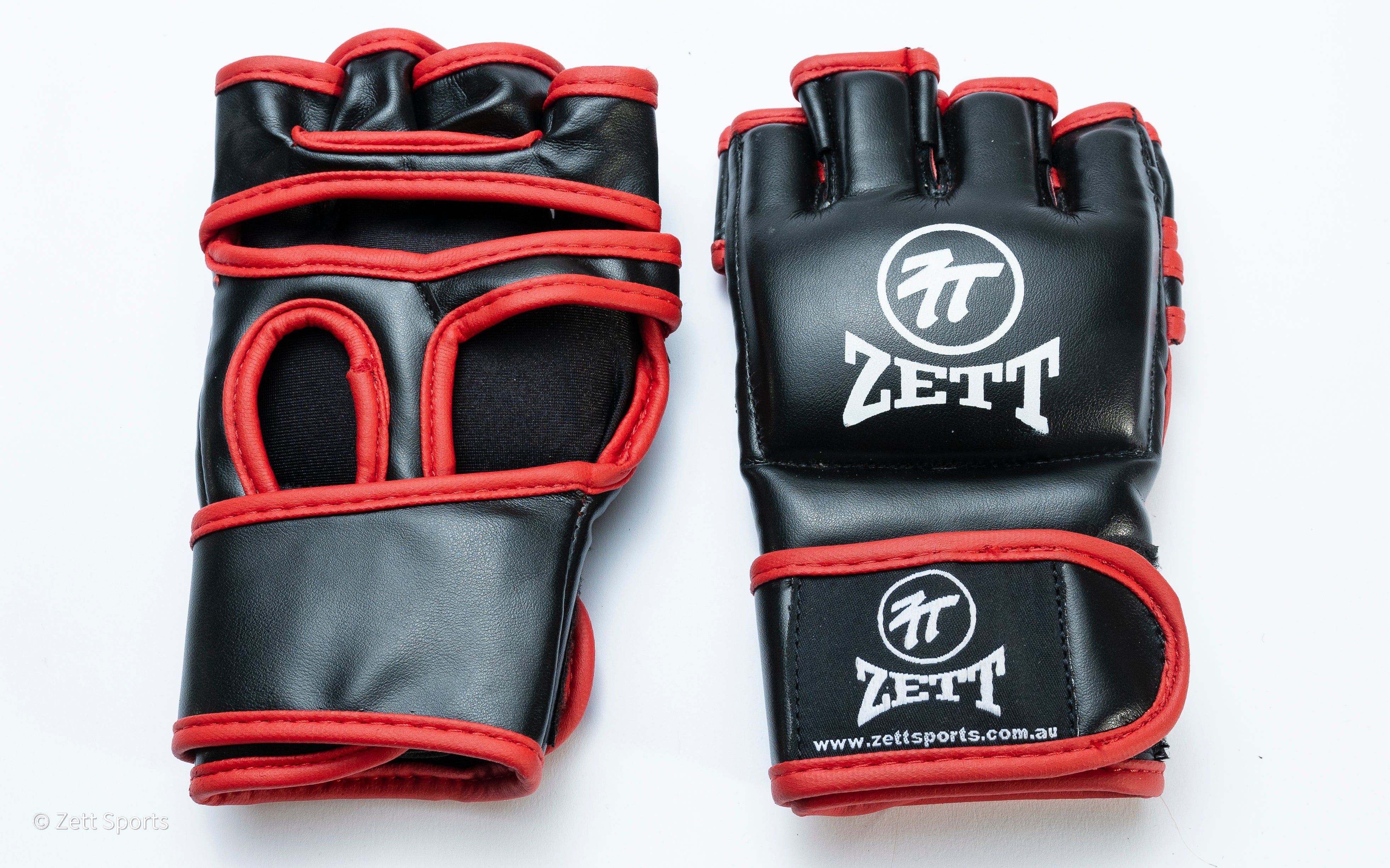 Zett MMA gloves in black, palm and wrist view