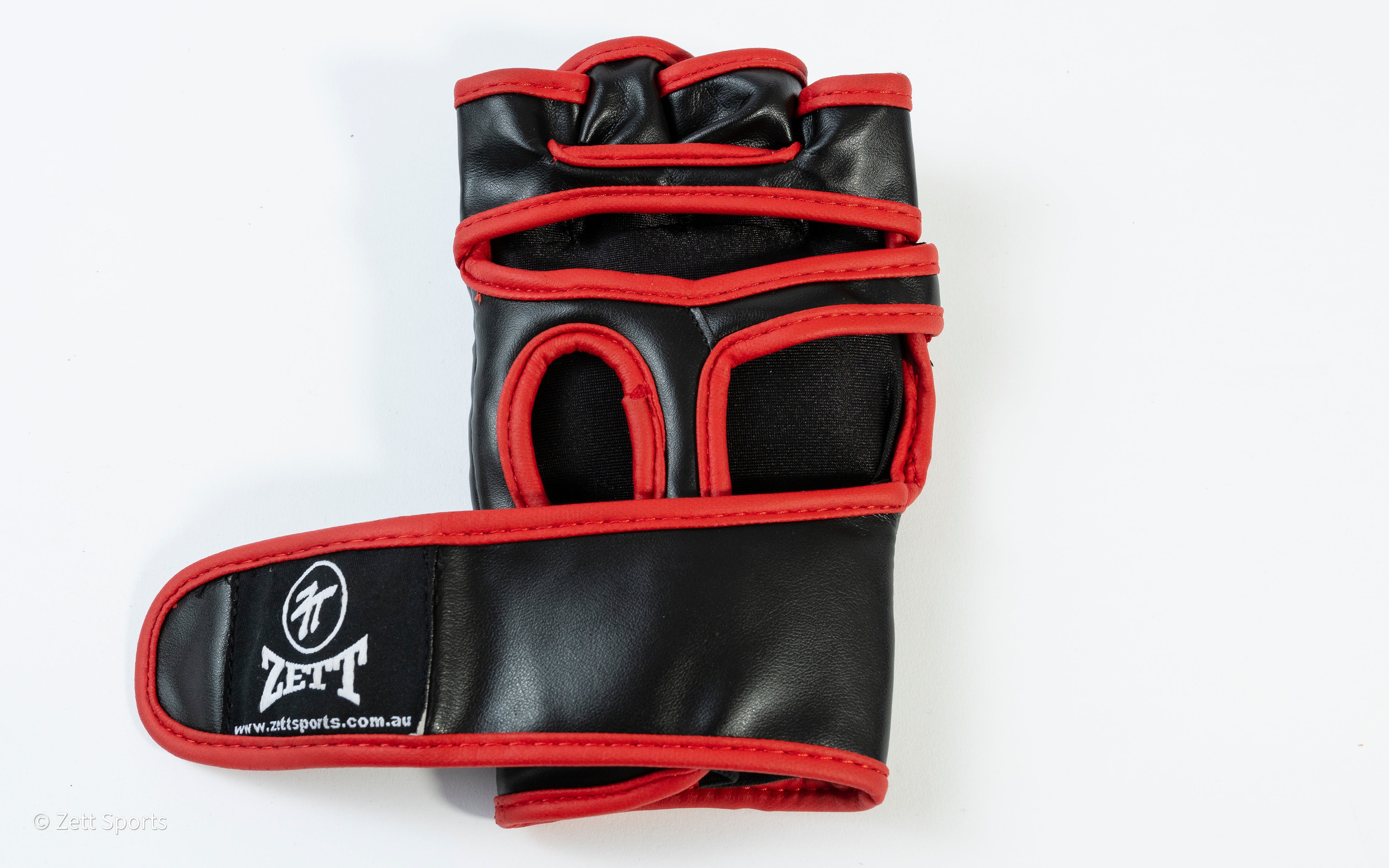Zett MMA sparring gloves in black, front view