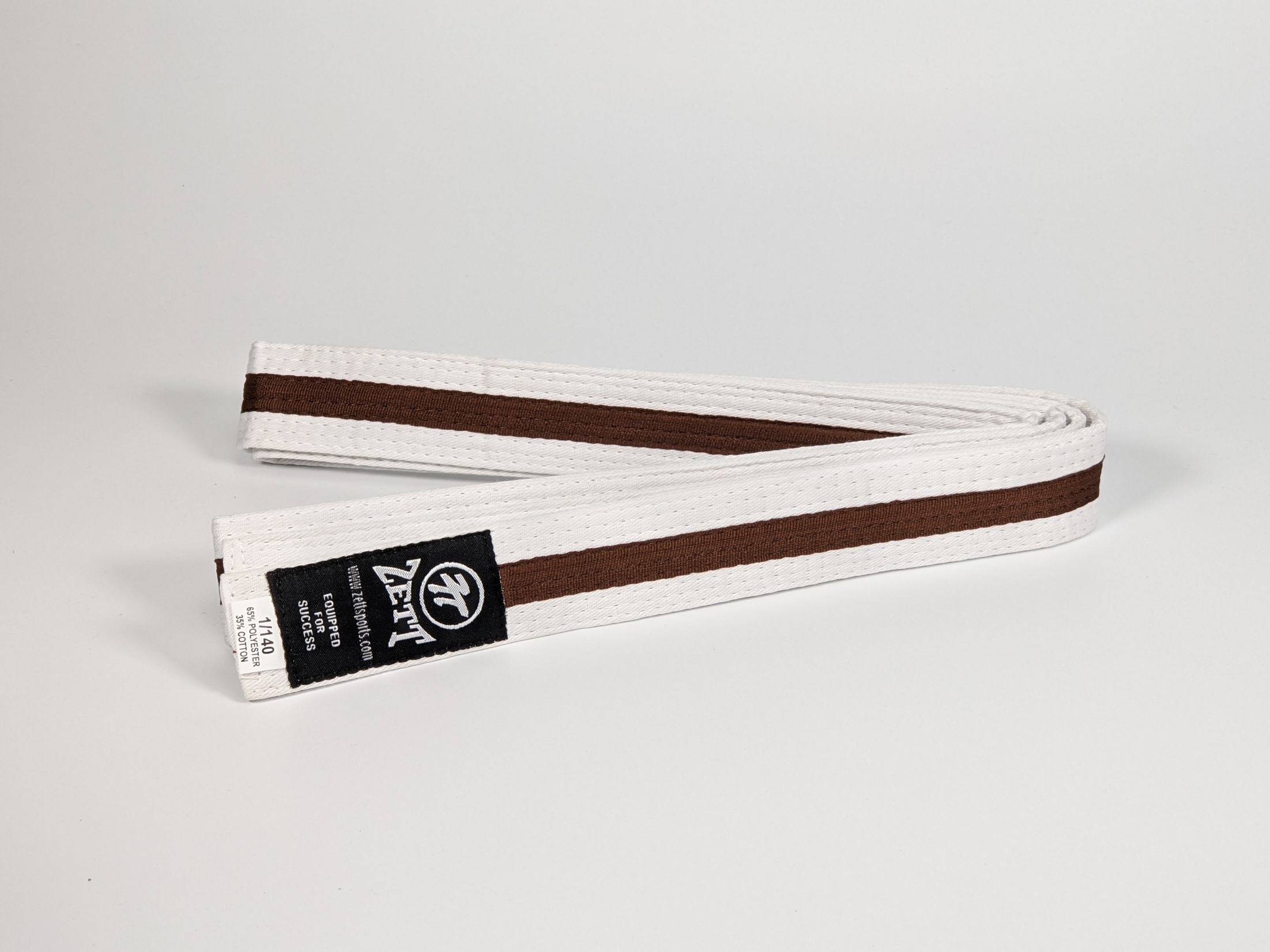 Zett white belt with brown stripe
