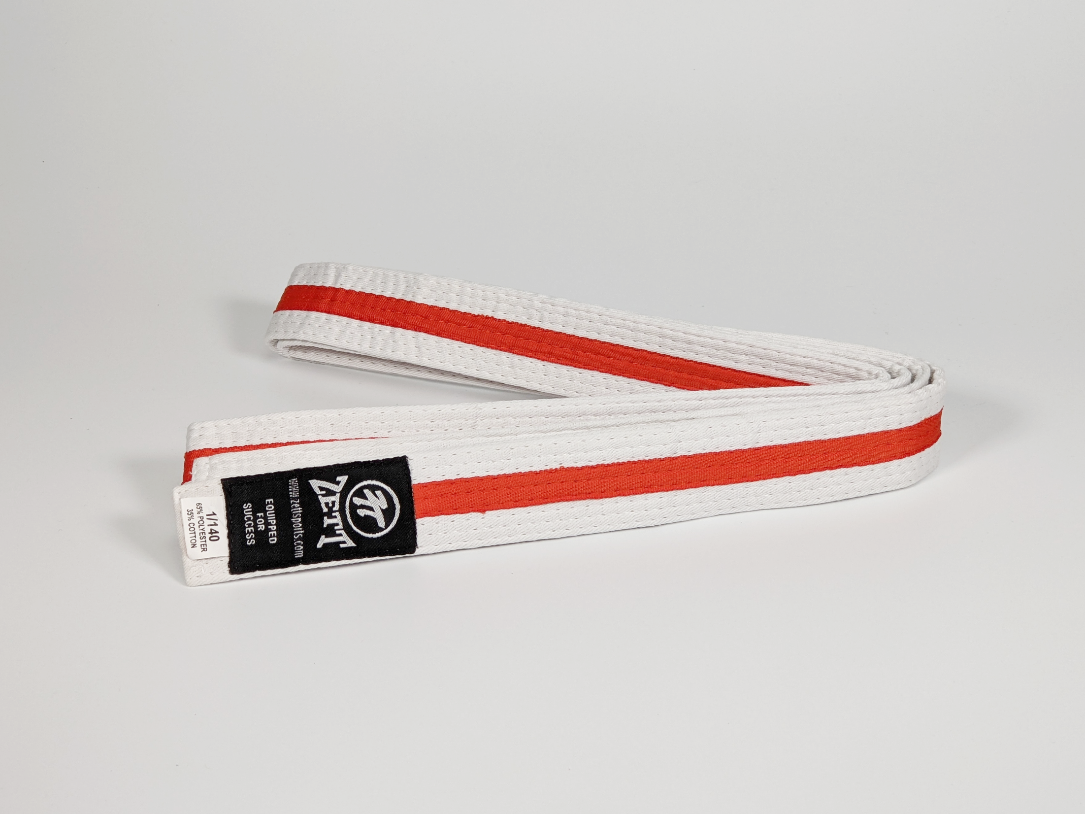 Zett white belt with orange stripe