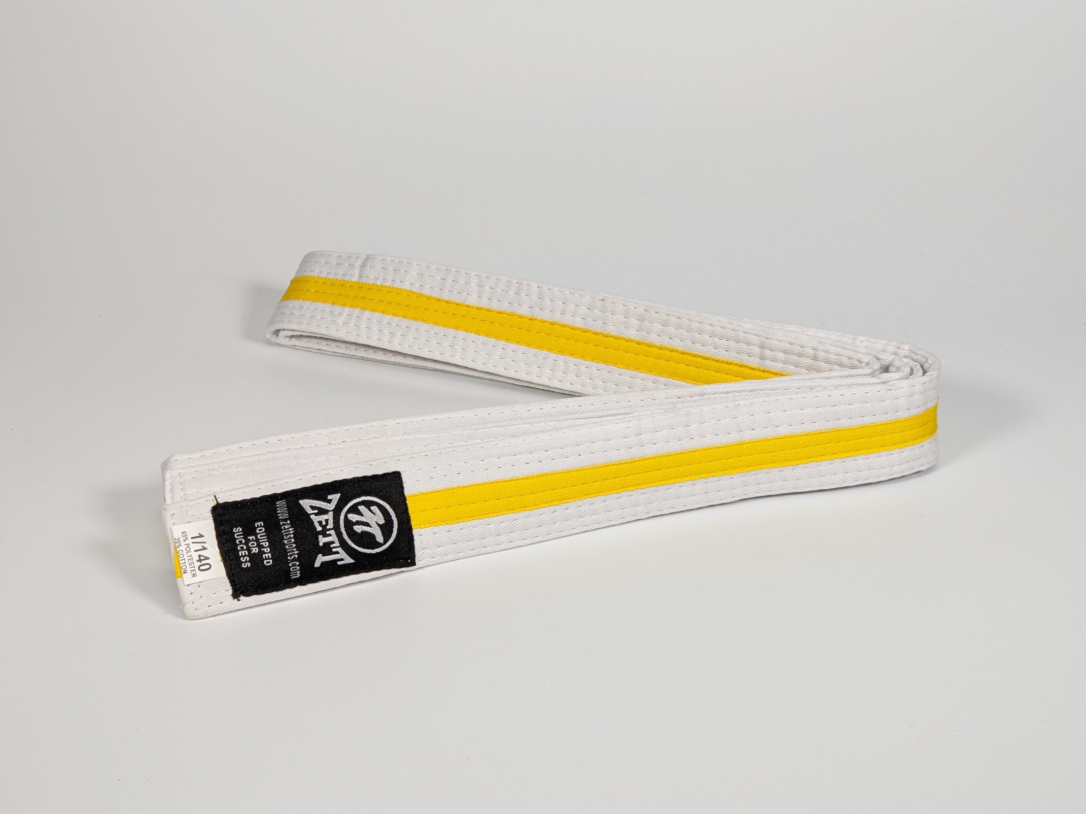 Zett white belt with yellow stripe